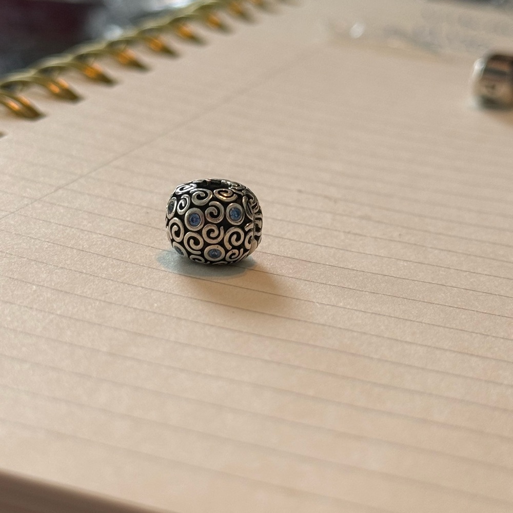Pandora wind swirls clip with blue cubic zirconia DISCONTINUED CHARM